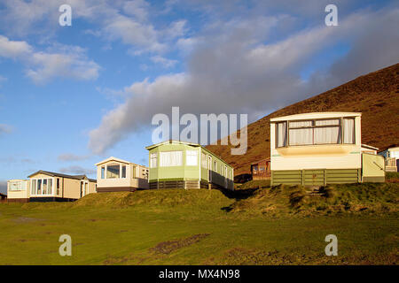 Caravan Park Hillend - Mobil-home maisons de vacances à Llangennith sur la péninsule de Gower en hiver, les caravanes sont fermées jusqu'au printemps. Banque D'Images