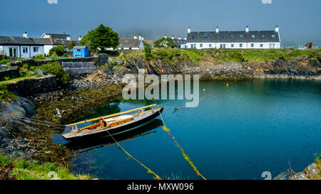 Easdale Island, la plus petite île habitée en permanence de l'Hébrides intérieures, de l'Écosse. Une partie du port. Banque D'Images