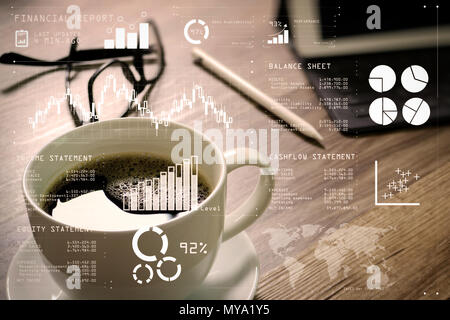 Les données du rapport financier de l'exploitation d'une entreprise (bilan et compte de résultat et le schéma) en tant que concept Fintech.tasse à café et table numérique sm dock Banque D'Images