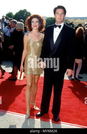 PASADENA, CA - 25 août : (L-R) L'actrice Lara Flynn Boyle et l'acteur Kyle MacLachlan assiste à la 43e Primetime Emmy Awards annuel le 25 août 1991 à Pasadena Civic Auditorium à Pasadena, en Californie. Photo de Barry King/Alamy Stock Photo Banque D'Images