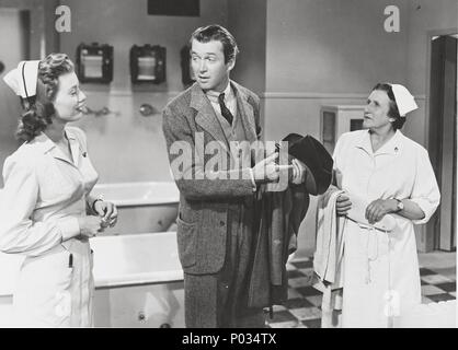 Titre original : HARVEY. Titre en anglais : HARVEY. Directeur de film : Henry Koster. Année : 1950. Stars : James Stewart ; PEGGY DOW. Credit : UNIVERSAL PICTURES / Album Banque D'Images