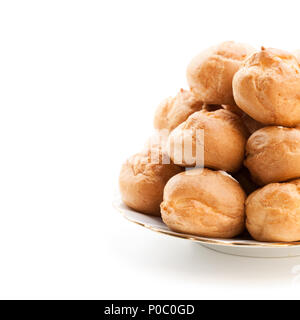Profiteroles maison isolated on white Banque D'Images