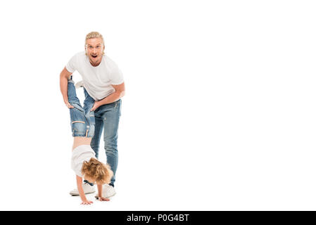 Cheerful père et fils s'amuser ensemble isolated on white Banque D'Images