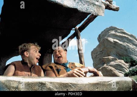 Titre original : LE FLINTSTONES. Titre en anglais : LE FLINTSTONES. Directeur de film : Brian Levant. Année : 1994. Stars : Rick MORANIS ; John Goodman. Credit : UNIVERSAL PICTURES / Album Banque D'Images