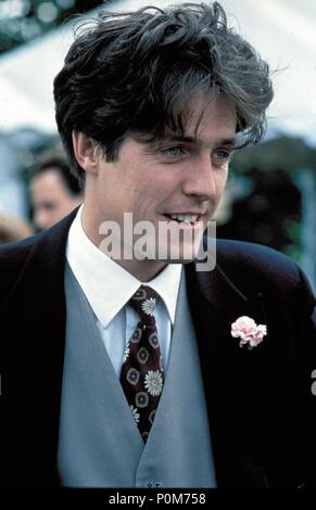 Film Original Titre : Quatre mariages et un Enterrement. Titre en anglais : Quatre mariages et un Enterrement. Directeur de film : Mike Newell. Année : 1994. Stars : Hugh Grant. Credit : GRAMERCY PICTURES / Album Banque D'Images