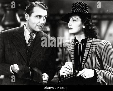 Titre original : His Girl Friday. Titre en anglais : His Girl Friday. Directeur du film : Howard Hawks. Année : 1940. Stars : Ralph Bellamy ; Rosalind Russell. Credit : Columbia Pictures / Album Banque D'Images