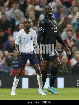 L'Angleterre Sir Mo Farah (à gauche) et du monde XI Usain Bolt (à droite) au cours de l'aide de l'UNICEF au match de football d'Old Trafford, Manchester. ASSOCIATION DE PRESSE Photo. Photo date : dimanche 10 juin 2018. Histoire voir l'activité de l'aide de soccer. Crédit photo doit se lire : Martin Rickett/PA Wire. Banque D'Images