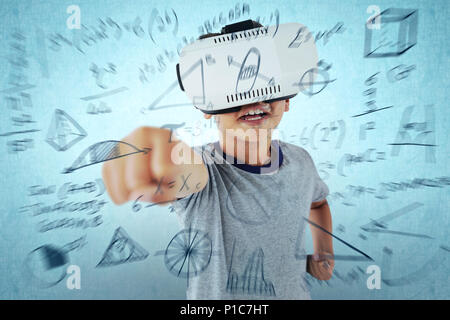 Portrait of boy wearing casque virtuel jouer Banque D'Images