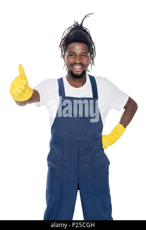Portrait of smiling african american cleaner showing thumb up isolated on white Banque D'Images