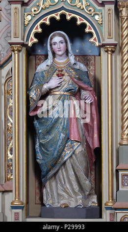 Coeur Immaculé de Marie statue sur l'Autel du Sacré-cœur de Jésus dans l'église de Saint Matthieu à Stitar, Croatie Banque D'Images