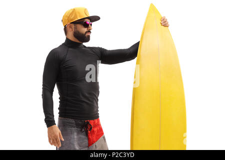 La tenue d'un surfeur surf isolé sur fond blanc Banque D'Images