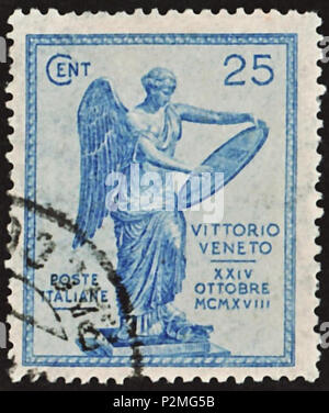 . Cachet du Royaume d'Italie ; 1921 ; timbre commémoratif pour le 3ème anniversaire de la bataille de Vittorio Veneto qui a lancé le 24 octobre 1918 et qui s'est terminée par une défaite d'une armée des puissances de l'axe et qui a donné à l'Italie un siège permanent au Conseil de la Société des nations. (Dans cette bataille livrée aux unités militaires italiens sur le côté de l'Entente contre une armée des puissances de l'axe sous la direction de l'Autriche-Hongrie.) ; Le timbre représente le soi-disant "La victoire de Brescia" avec un 4-lignes inscription "VITTORIO VENETO / XXIV / Octobre / MCMXVIII". ; le cachet Stamp : Michel : Non Banque D'Images