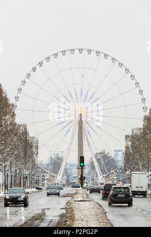 France, Paris, Avenue des Champs Elysées, l'Obélisque de la Concorde et de la Grande Roue, de neige le 07/02/2018 Banque D'Images