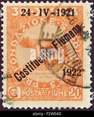 . Cachet de l'État libre de Fiume (nom allemand de Rijeka en Croatie contemporaine ;) ; 1922 ; émission commémorative à l'occasion de l 'ouverture de l' Assemblée constituante plats en 1922 ; supplément stamp à partir de 1919 de l'Italie de Fiume avec trois lignes de surimpression de 1922 ; motif de la louve en cercle encadrée ; timbre cachet : Michel : n° 146 ( = n° 53 de 1919 avec la surimpression) Couleur : orange Filigrane : aucune valeur nominale : 20 100. (Centesemi)  + 5 lire (comme de la charité en supplément pour un fonds étudiant) validité d'affranchissement : de 12 avril 1922 jusqu'en 1924 Stamp taille image (zone imprimée) : 23,5 x 2 Banque D'Images