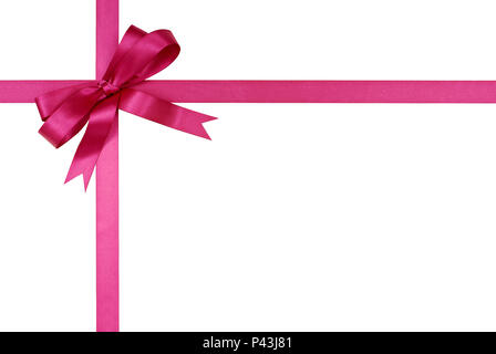 Ruban cadeau rose et bow isolé sur fond blanc Banque D'Images