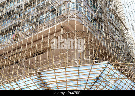 À Hong Kong et de la Chine et d'autres parties de l'Asie, le bambou est souvent utilisé pour l'échafaudage pour la construction immobilière à la place de l'acier ou du fer d'échafaudages Banque D'Images