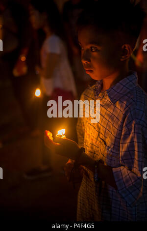 Participant à une procession du vendredi Saint à Gasan, dans l'île Marinque, aux Philippines Banque D'Images