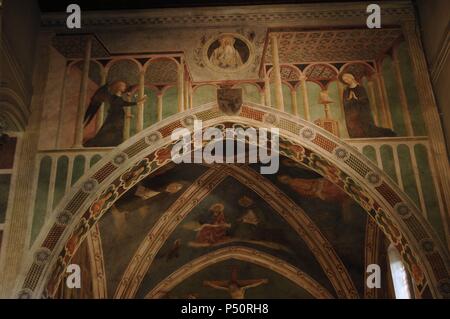 L'Italie. Rome. La Basilique de Saint Clément (Basilica di San Clemente al laterano). Chapelle Sainte Catherine. Fresco, 1425-1431, par Masolino da Panicale (1383-1447). L'annonciation avec Dieu le Père dans un médaillon. Banque D'Images