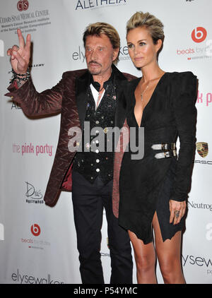 Johnny Halliday, Laeticia Halliday 6e partie rose à la Drai à Los Angeles.Johnny Halliday, Laeticia Halliday 083 cas à Hollywood Life - Californie, Red Carpet Event, USA, Cinéma, Célébrités, photographie, Bestof, Arts, Culture et divertissement, Célébrités, Mode de vie meilleure, Hollywood, événement dans la vie d'Hollywood, Californie - Tapis rouge et en coulisses, musique, célébrités, Topix en couple, en famille (mari et femme) et les enfants - les enfants, frères et sœurs, tsuni@Gamma-USA.com Tsuni enquête de crédit / USA, 2010 Banque D'Images