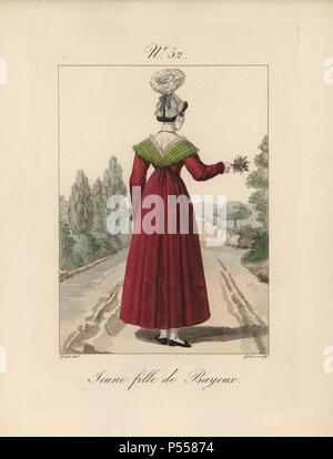 Jeune fille de Bayeux. Aucune femme de la haute société serait porter un tel bas-coupe encolure à Paris comme ce floozy. Le capot n'a pas de queue, mais la base et le papillon (papillon) sont décorées avec de belles broderies. À la main, gravure de mode illustration par Lante gravée par Gatine de Louis-Marie Lante's 'Costumes des femmes du Pays de Caux,' 1827/1885. Avec leurs grands chapeaux dentelle alsacienne, les femmes de Caux et de Normandie ont été célèbre pour l'élégance et le style. Banque D'Images