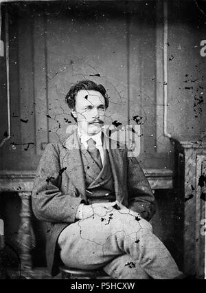 [Un homme assis] [GRAPHIC].. 1 : négatif, verre au collodion humide, n&b ; 11 x 8,5 cm. vers 1875. Thomas, John, 45 Un homme assis ANL3364656 Banque D'Images