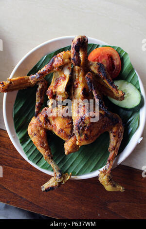 Poulet grillé - version indonésienne. Ou localement connu sous le nom de 'Ayam Bakar'. Banque D'Images