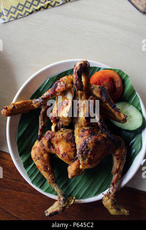 Poulet grillé - version indonésienne. Ou localement connu sous le nom de 'Ayam Bakar'. Banque D'Images