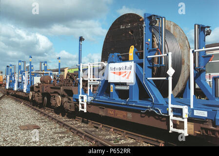 Network Rail train pose de câbles. Banque D'Images