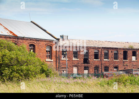 Les bâtiments industriels abandonnés dans la région de Barrow in Furness, Cumbria, Royaume-Uni Banque D'Images