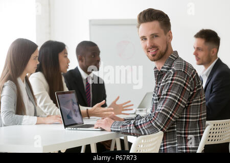 Portrait of smiling manager posing looking at camera Banque D'Images