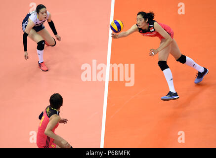 (180629) -- SHANGHAI, 29 juin 2018 (Xinhua) -- Zhu Ting (R) de la Chine creuse un col au cours de la piscine une correspondance entre la Chine et le Brésil à la FIVB 2018 Volley-ball Ligue des Nations Unies les finales de Nanjing, capitale de la province de Jiangsu, Chine orientale, le 29 juin 2018. La Chine a perdu 0-3. (Xinhua/Yuging Han)(WLL) Banque D'Images