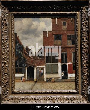 Johannes Vermeer (1632-1675). Peintre hollandais. Vue sur les maisons à Delft, connue sous le nom de la petite rue, c. 1658. Rijskmuseum. Amsterdam. Aux Pays-Bas.