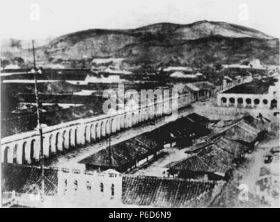 Español : Plaza de Armas en 1860. Se aprecia El portal del Comercio a la izquierda y el Real Palacio al fondo . 1860 70 Plazarmas1860 Banque D'Images