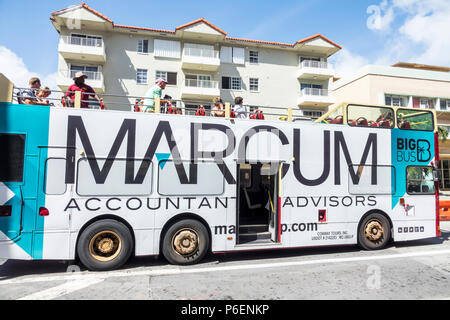 Miami Beach Florida,Collins Avenue,Big bus double-decker,publicité panneau mobile,visite guidée, les visiteurs voyage touristique Banque D'Images