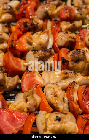 Grillades de viande et de tomate Banque D'Images