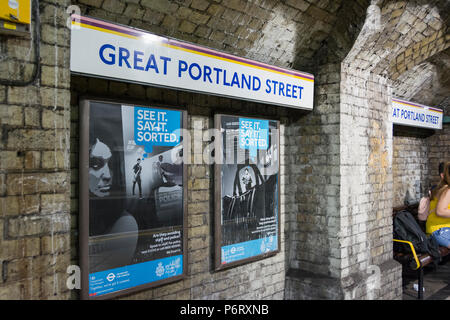 Le voir, le dire, l'affiche de la campagne de sécurité triés sur la station de métro Great Portland Street Banque D'Images