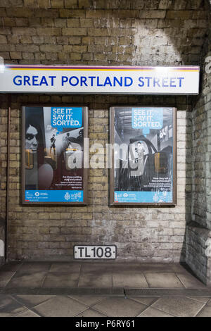 Le voir, le dire, l'affiche de la campagne de sécurité triés sur la station de métro Great Portland Street Banque D'Images