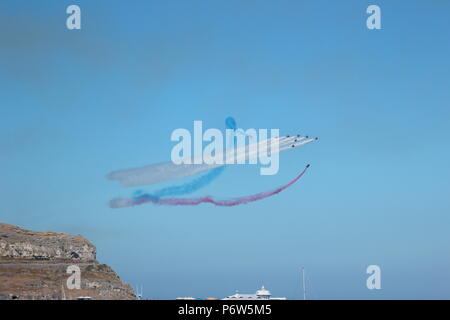 La Journée des Forces armées. Llandudno. Les flèches rouges effectuer aerobatic Banque D'Images