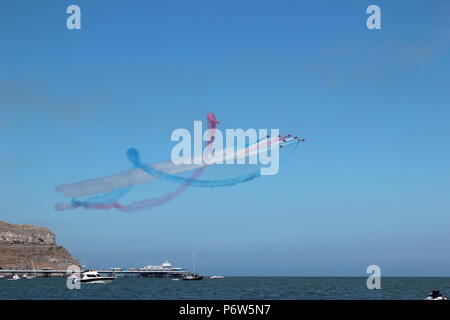 La Journée des Forces armées. Llandudno. Les flèches rouges effectuer aerobatic Banque D'Images