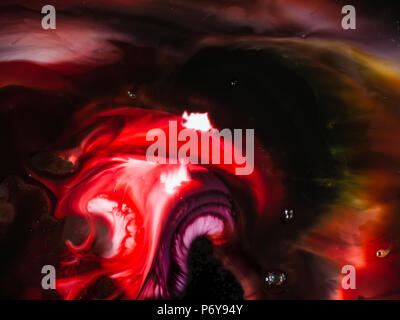 Résumé fond, divers pigments et colorants créent une riche texture, couleur, arrière-plan flou Banque D'Images