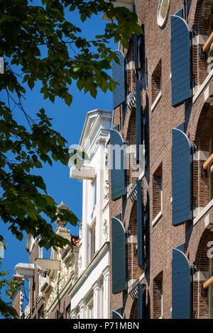 Façades des entrepôts du 18ème siècle converti en propriétés résidentielles, Amsterdam, Pays-Bas Banque D'Images