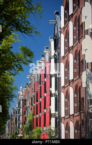 Façades des entrepôts du 18ème siècle converti en propriétés résidentielles, Amsterdam, Pays-Bas Banque D'Images