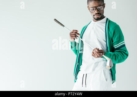 Handsome african american golfeur en vintage sportswear, isolated on white Banque D'Images