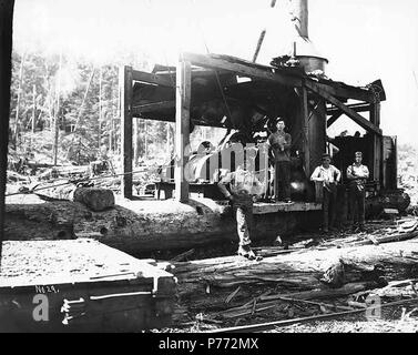 . Anglais : l'équipage avec un âne, Puget Sound moteur Mill et Timber Company, éventuellement au Majestic, ca. 1922 . Anglais : Légende sur l'image : n° 29 PH Coll 516,3002 Puget Sound Mill & Timber Company couper ses bois d'abord à Port Angeles en 1914. Opérations d'exploitation forestière étaient situés au Twin. Le moulin était à la faillite en 1927. L'emplacement de Majestic est inconnue ; c'était probablement dans le comté de Clallam [cataloger's note]. Sujets (LCTGM) : bois de sciage ; ânes ; vapeur--Washington (État) ; industrie du bois--Washington (Staet) ; l'usine de Puget Sound et le bois d'entreprise--People--Washington (État) ; l'usine de Puget Sound et Ti Banque D'Images