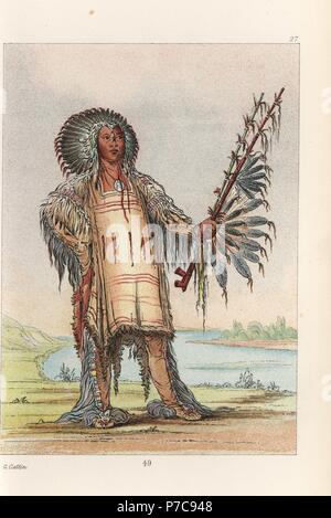 Ha-na-tah-nu-mauh, Wolf Chef, chef des Mandans, les gens en tenue de peaux et coiffe de plumes de corbeau. Lithographie coloriée de George Catlin's Manners, les douanes et l'état des Indiens d'Amérique du Nord, Londres, 1841. Banque D'Images