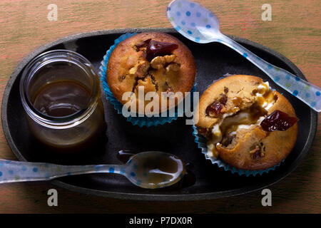 Muffins caramel Date de caramel et crème glacée Banque D'Images