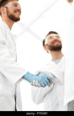 Cropped shot of medical workers shaking hands Banque D'Images