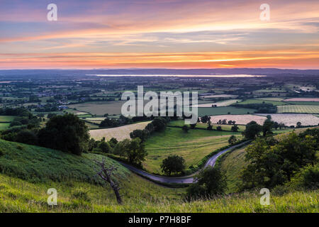 Coucher du soleil sur la vallée de la Severn de Coaley Peak Banque D'Images