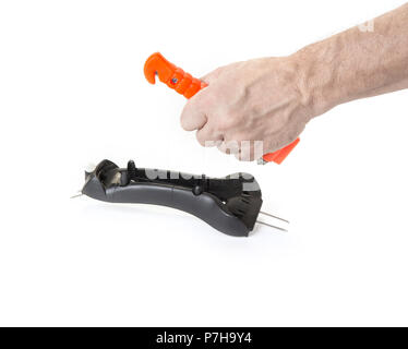 Marteau de sécurité dans la voiture sur le livre blanc Banque D'Images