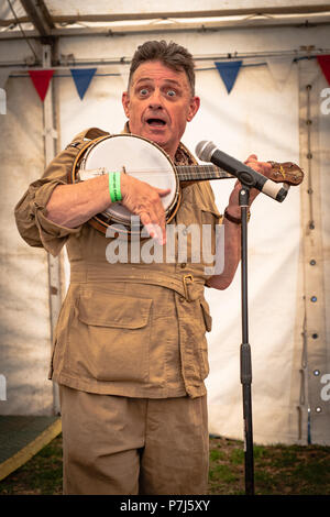 Artiste de troupes avec chant banjo Banque D'Images